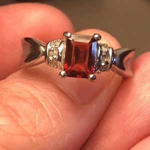 Garnet and white topaz ring